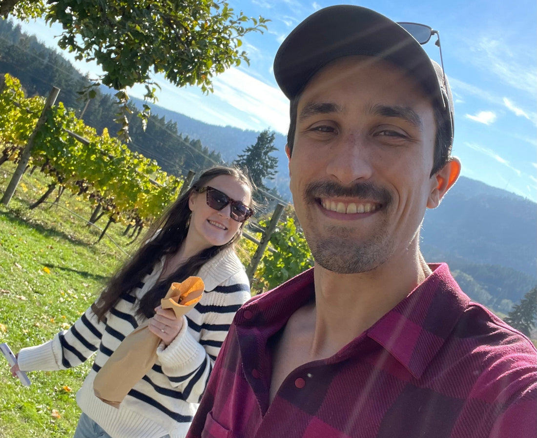 Jordyn and Andrew enjoying a peaceful moment at an orchard in Salt Spring Island, BC—embracing nature and wellness.